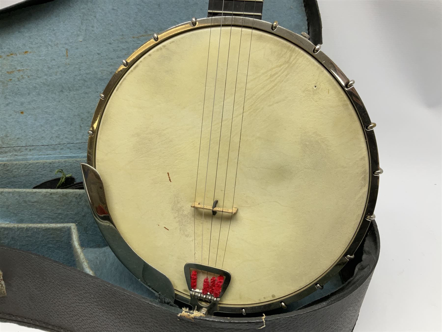 Five-string banjo by Clifford Essex Co. 15A Grafton Street, Bond Street, London W, with mother-of-pearl inlaid ebony fingerboard L92cm; in carrying case with strap