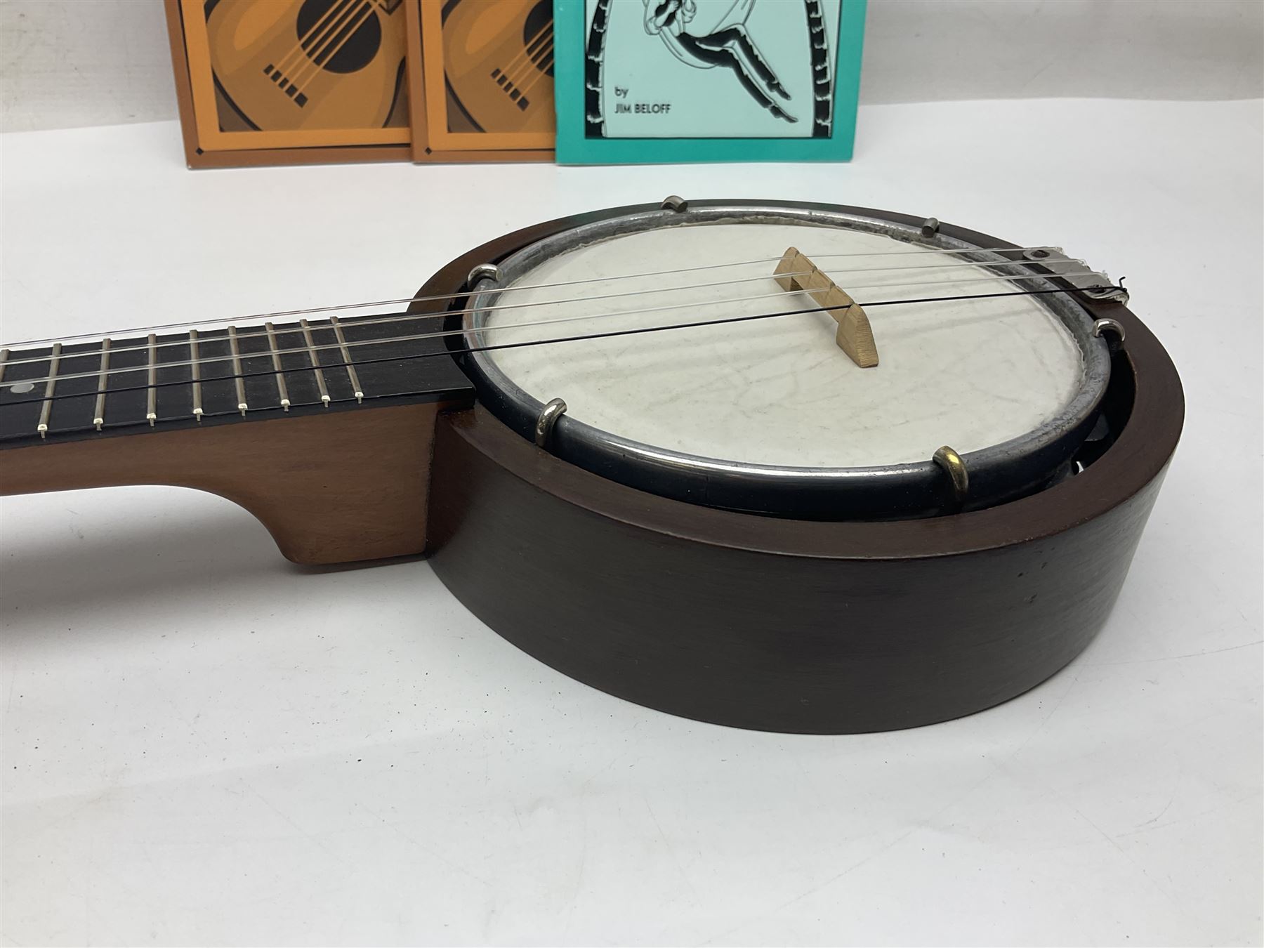 W.D. Keech banjolele pat.219720/23 with etched signature to the back; serial no.A12082 L55cm; and a restored Italian mandolin with segmented lute back; together with three music books
