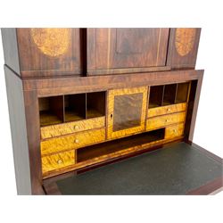 Early to mid-19th century figured mahogany Continental secrétaire à abattant, stepped top fitted with single cupboard, inlaid with oval figured amboyna panels, the fall front inlaid with shell motif enclosing a satinwood interior fitted with cupboard, drawers, and pigeon holes, three long drawers below, on square tapering feet
