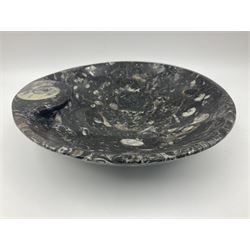 Circular dish with a raised goniatite, with orthoceras and goniatite inclusions, age: Devonian period, location: Morocco, D22cm, H5cm
