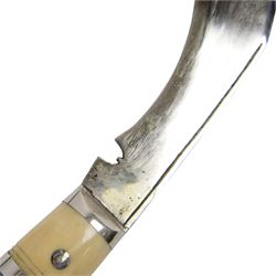 Pair of kukri knives, with with ebonised and bone handles, with two smaller knives, with a leather scabbard with floral silvered decoration, L44cm