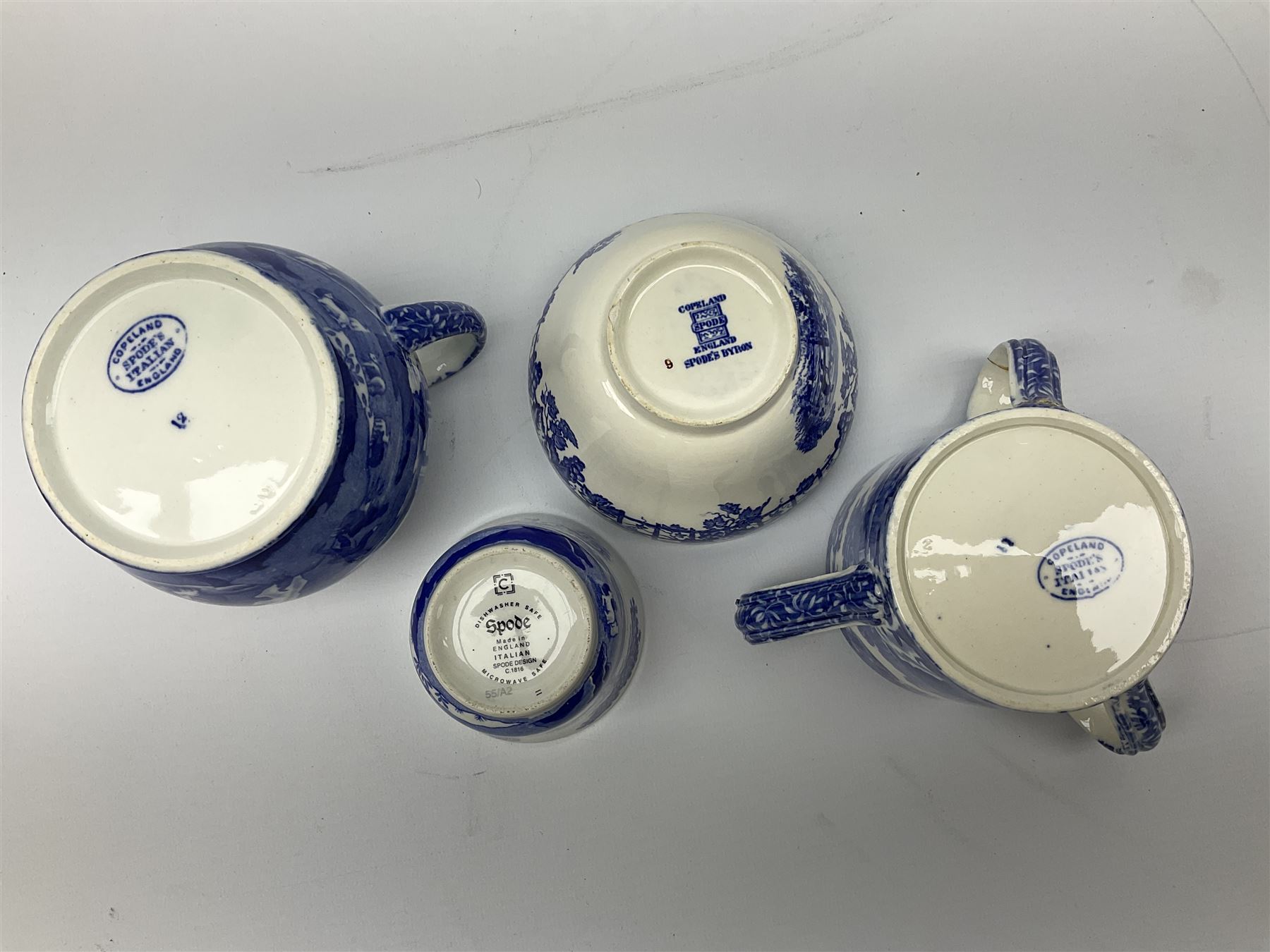 Copeland Spode Italian pattern tyg, inscribed with Auld Lang Syne to interior rim, with printed blue mark beneath (a/f), together with Spode Italian Pattern jug with blue mark, Spode’s Byron bowl with blue mark and Spode Italian pattern candle with black mark (4)