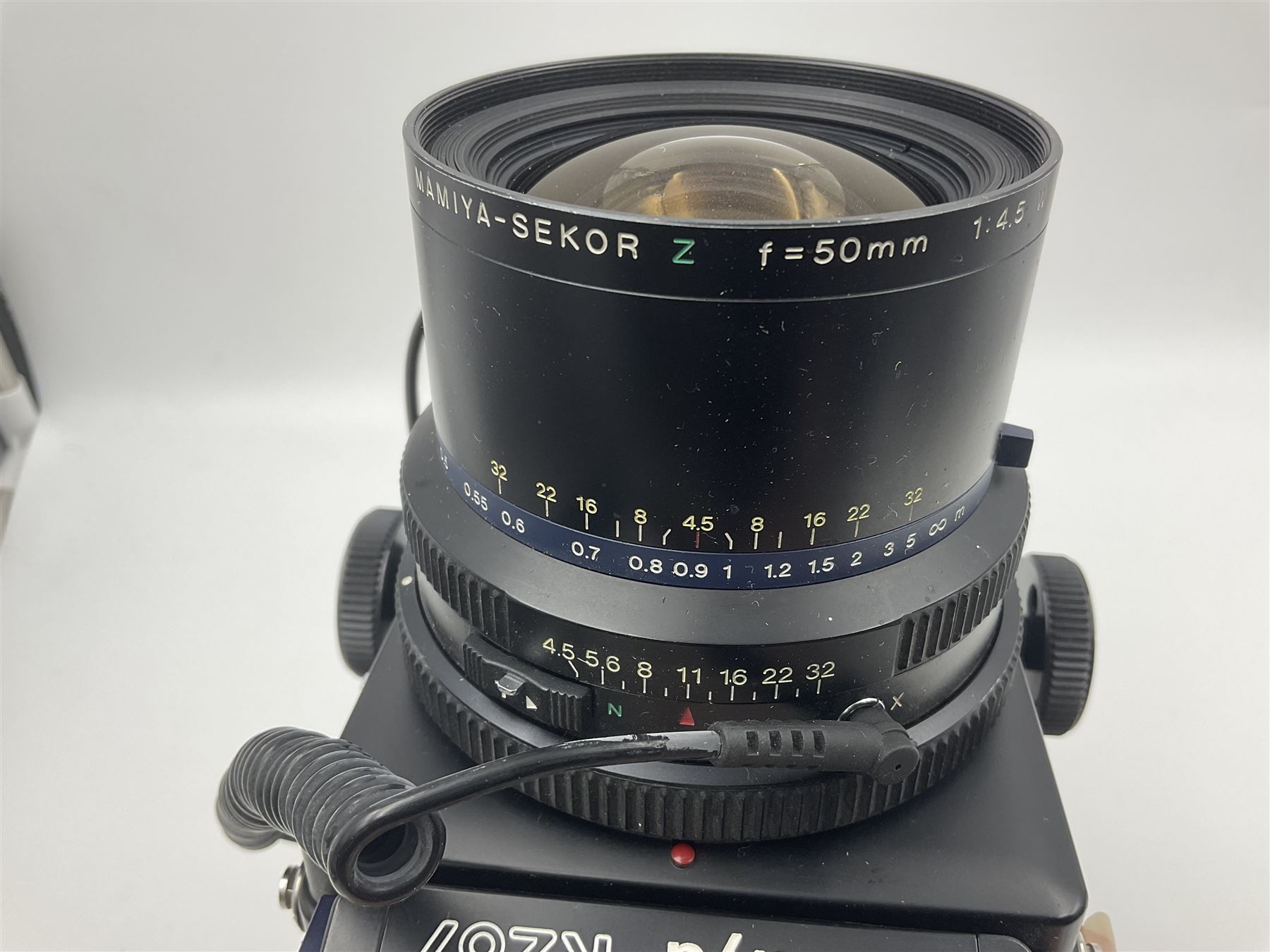 Mamiya RZ67 professional camera body, serial no 120282, with 'Mamiya-Sekor Z f=50mm 1:4.5 W' lens, serial no 18057 and RZ67 AE Prism Finder serial no 106809