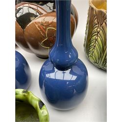 A group of pottery, to include pair of Bretby blue glazed vases of double gourd form, Bretby green glazed bowl, Wardle red glazed vase, Youghal mottled blue glazed vase, etc. 