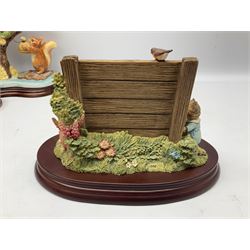 Four Border Fine Arts Beatrix Potter figures, comprising Tableau created to commemorate the Millenium together with a Border Fine Arts Limited Edition no 669814, The Tale of Peter Rabbit Tablet A1306, Four Little Rabbits A2442 and Sailing Home A2443