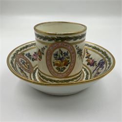 Sèvres soft paste porcelain coffee can and saucer with date code for 1780, painted with pink oval panels bordering bouquets of flowers, united by swags of flowers tied with purple ribbons, within laurel leaf borders, interlaced LL monogram enclosing date letters CC above painters marks for Nicquet, coffee can H7.5cm, saucer D15cm