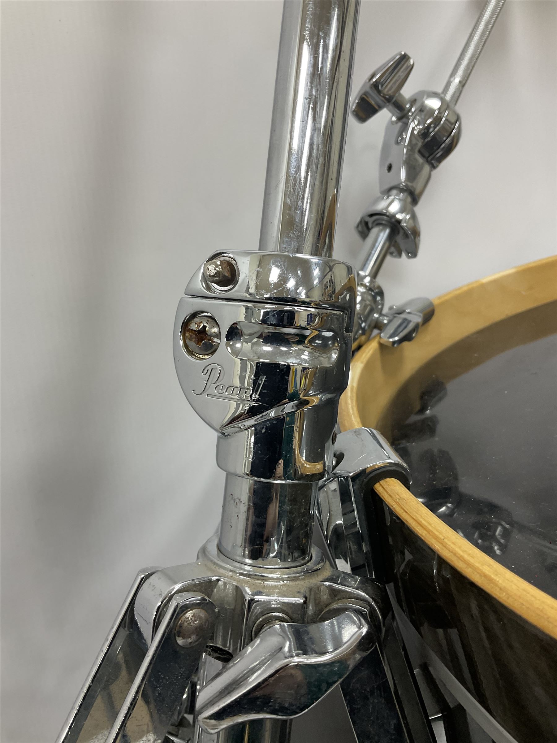 Pearl Vision SST Birch Ply shell four-piece drum kit in black comprising bass drum with foot pedal and three graduated toms; together with Pearl Custom Alloy Sensitone steel snare drum, drum and cymbal stands, microphone stand, stool and various drum sticks 