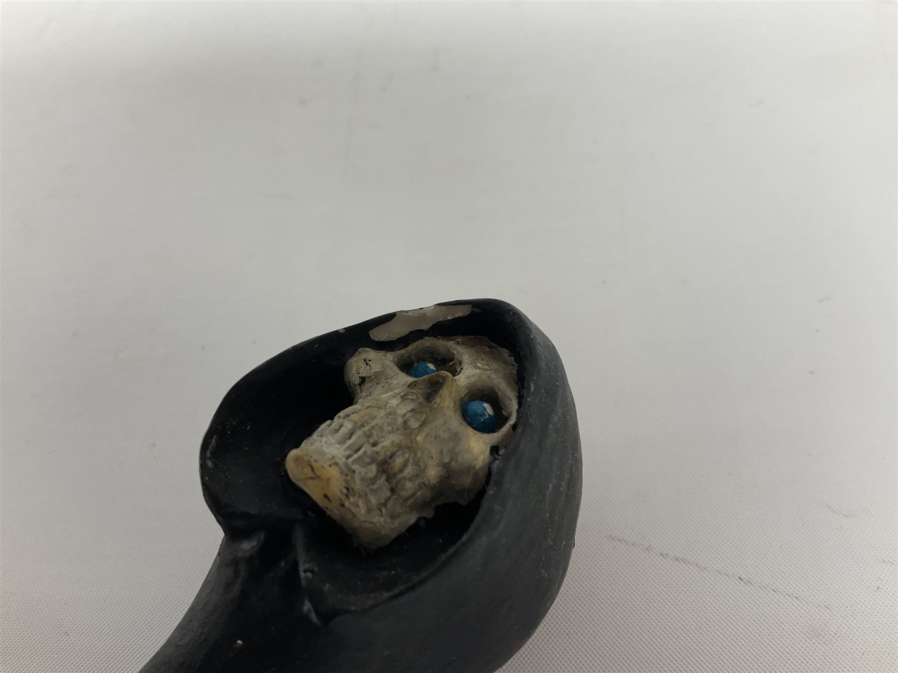 Terry Pratchett Discworld figures, designed by Clarecraft, comprising Cohen the barbarian, DW42, the Patrician, boxed, DW37, three Potions, DW18, DW19, DW20, two Death Bookstamps, DW50, the Gods Dice Box, boxed, DW26, together with two Discworld newsletters, volume 5, August 1998 and volume 6, August 1999. 