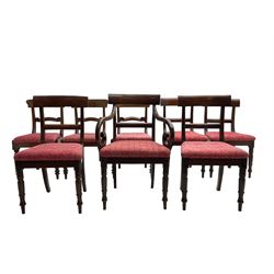 Harlequin set of eight 19th century mahogany bar back dining chairs, drop in seat upholstered in foliate patterned crimson fabric (7+1)