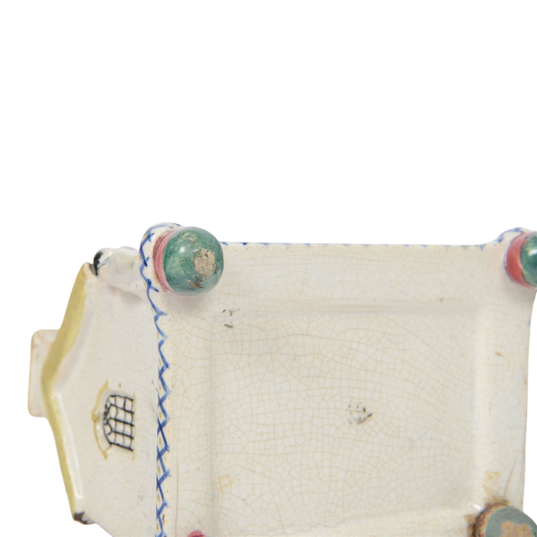 Mexborough Prattware Wesleyan Chapel Money Box, 1848, typically modelled as a chapel with putti to the front corners, on ball feet, inscribed  to the front Emma Sutton Bampton June 18 1848, H17cm, L15cm