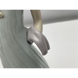 Three Lladro figures of ladies comprising 'The Flirt' model no 5789, 'Ingenue' model no 5487 and 'Carefree' model no 5790, all with boxes