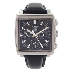 Tag Heuer Monaco gentleman's automatic chronograph wristwatch, circa 2005, Ref. CW2111-0, black dial with date aperture at 6 o'clock, subsidiary dials at 3, 6 and 9 for seconds, 30 minute and 12 hour recording, on black leather strap with original fold-over clasp