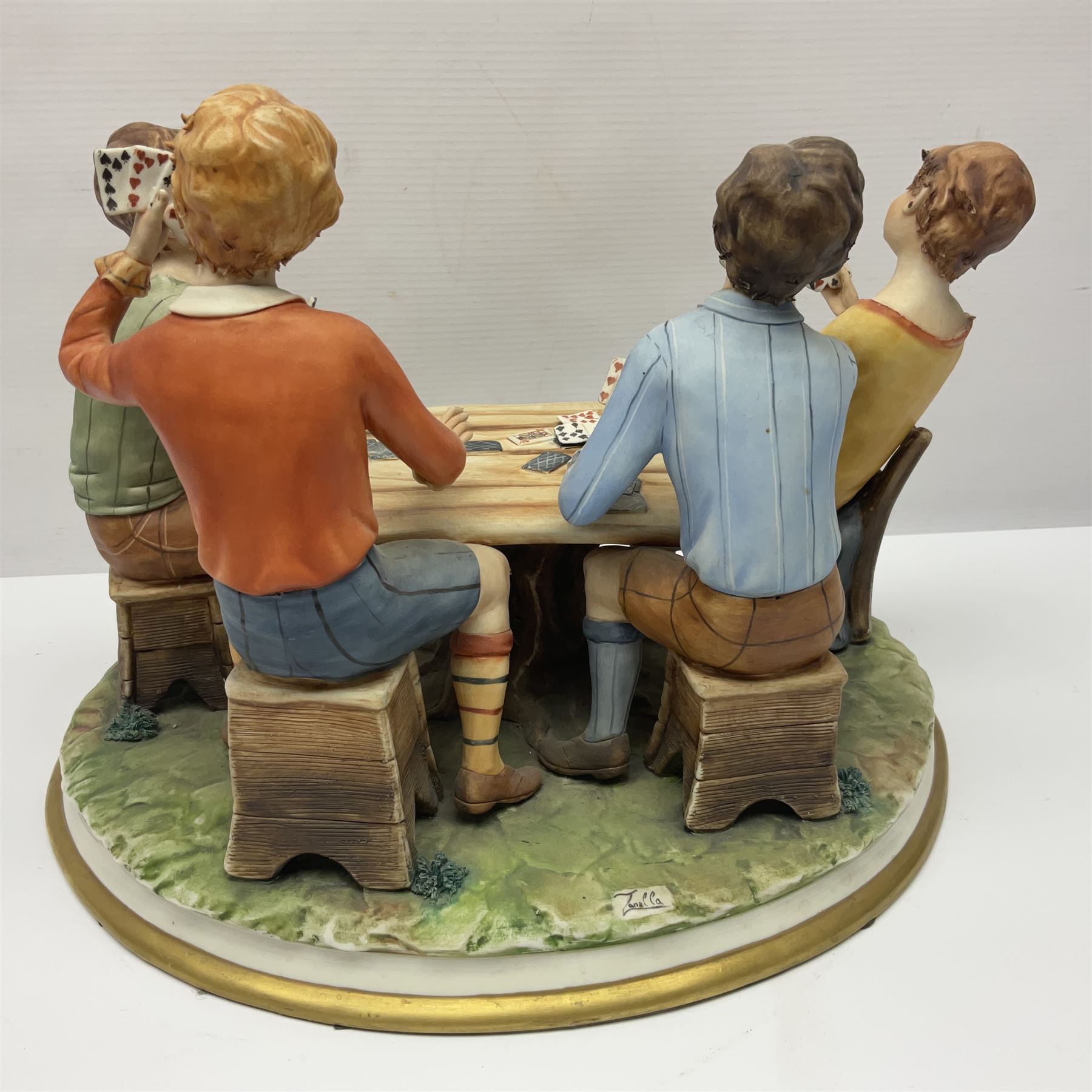 Capodimonte The Cheats, signed Zanella, together with another Capodimonte figure, H24cm  