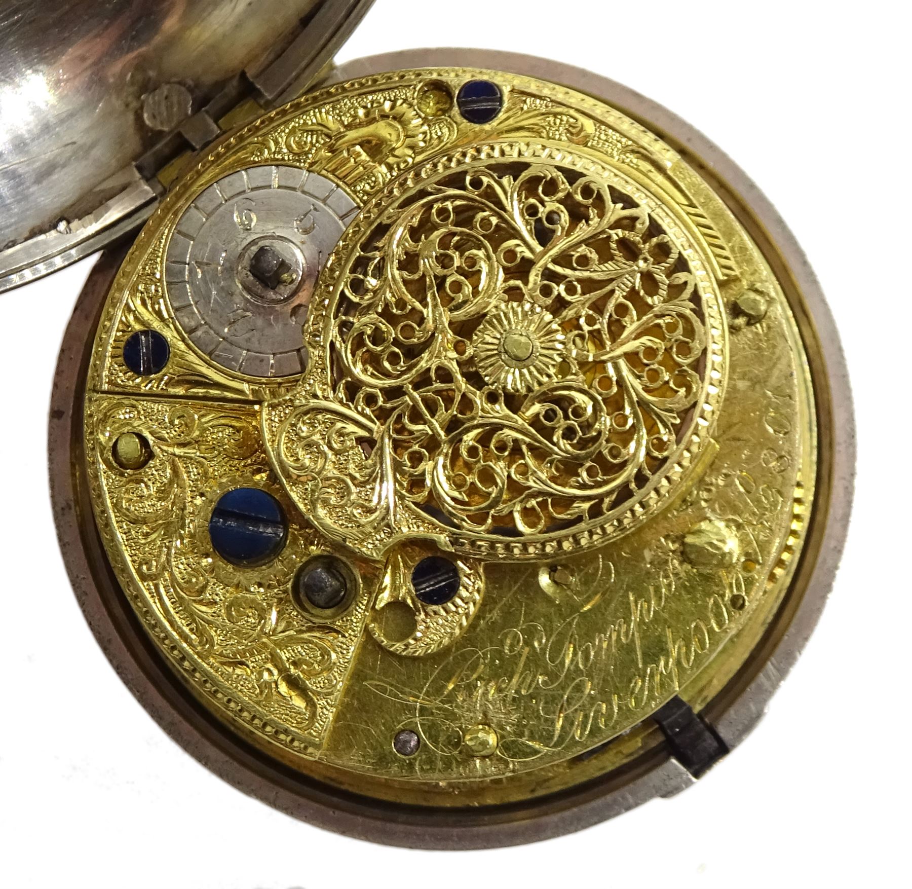 George III silver pair cased verge fusee pocket watch by Richard Tompion, Liverpool, No. 3801, round baluster pillars, pierced and engraved balance cock decorated with a heart, white enamel dial with Arabic numerals and outer quarter markers, beetle and poker hands, bull's eye glass, case by Henry Harding, Birmingham 1792