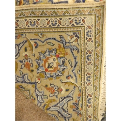  Keshan beige and blue ground rug, central medallion, floral field, repeating border, 290cm x 204cm  