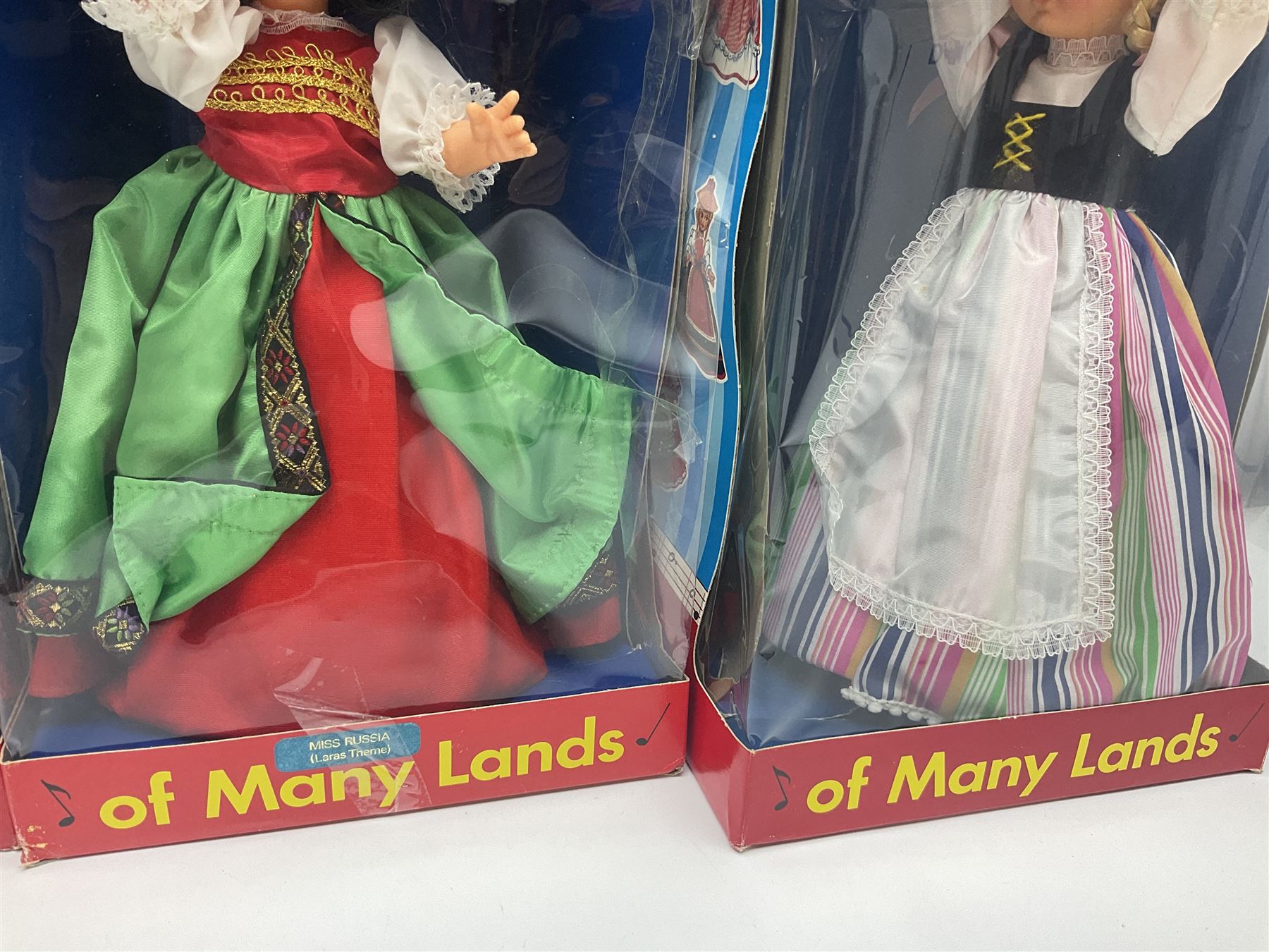 Four Mayfair Products Musical Dolls of Many Lands; original boxes and delivery boxes; and set of twelve Nationality Dolls with Sleeping Eyes; boxed (16)