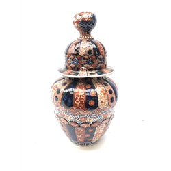  19th century Japanese Imari vase, moulded fluted body and conforming cover with globular finial, H38cm   