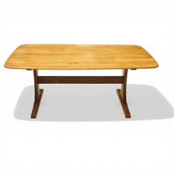 Ercol - mid-20th century golden elm and beech Windsor Range refectory style coffee table, rectangular top with rounded corners raised on end supports with sledge feet