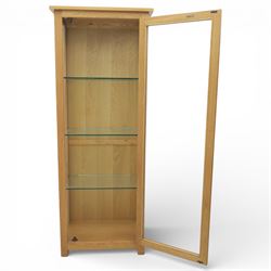 Contemporary light oak display cabinet, fitted with glazed door and glass sides, enclosing three adjustable glass shelves 