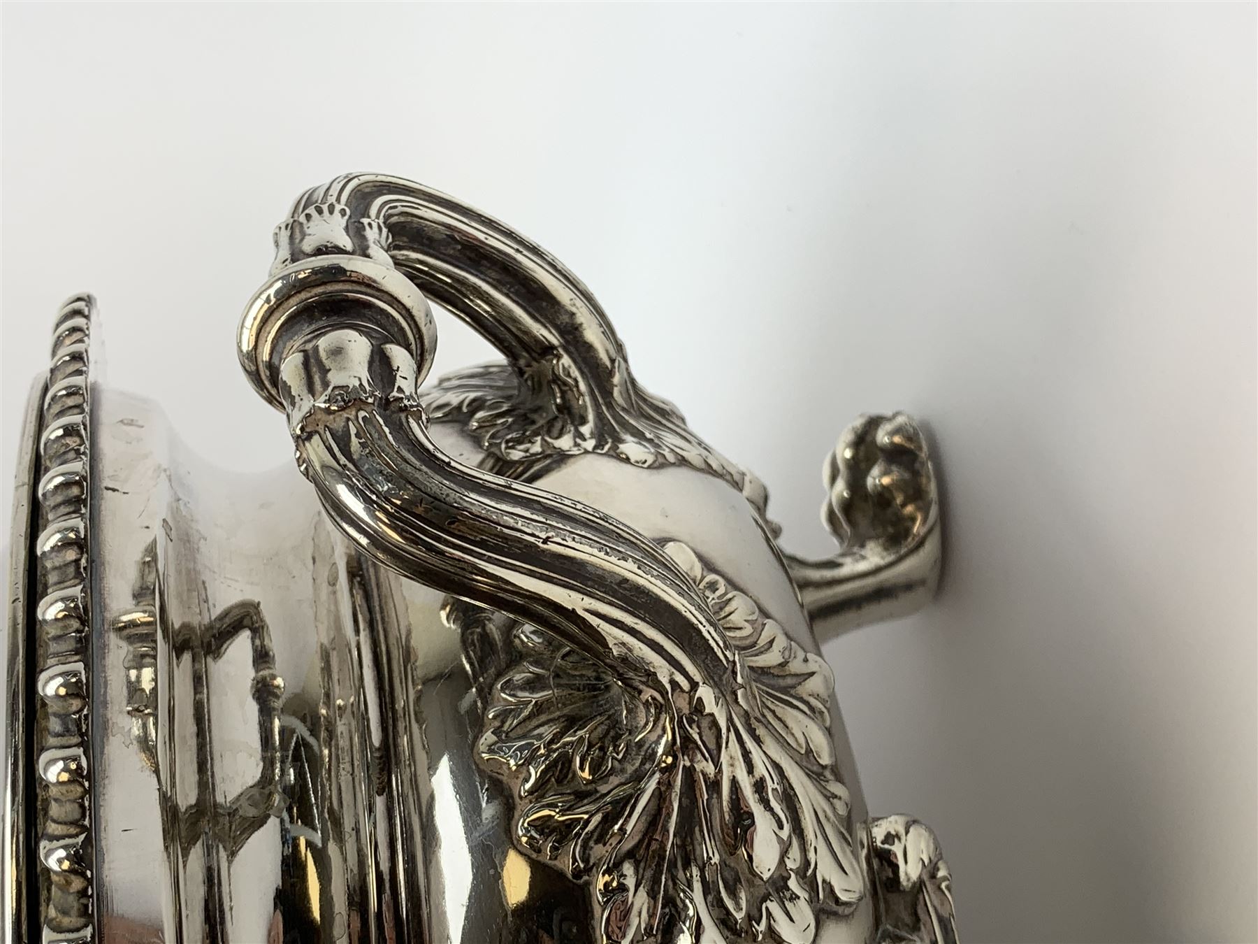 Matthew Boulton silver plated tureen and cover, the body of oval form with twin handles engraved with crest, probably for Whitgreave/Whitgrave family of Moseley Staffordshire, 'Regem Defendere Victum', (To defend the king even in his defeat/To defend the conquered king ), upon four paw feet, the cover with gadrooned rim and foliate loop handle 