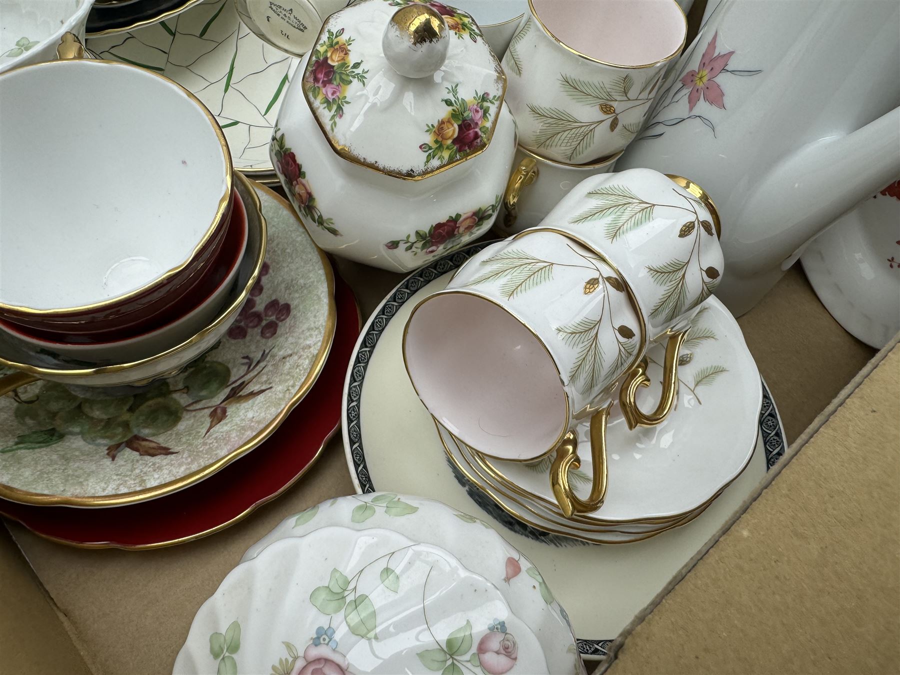 Aynsley harlequin cups and saucers, Royal Albert Old Country Roses vase and cover, Noritake coffee wares, Wedgwood Everest Goblet and various ceramics in two boxes