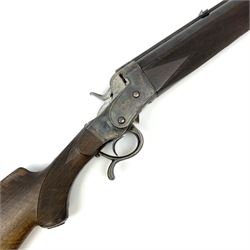 Rare Henry Pieper Liege seven-chambered solid barrel 297/30 calibre rim-fire volley gun with six barrels around a central seventh barrel drilled for simultaneous fire, built on a Remington type rolling block action, blued 62cm barrel with raised rib and twin rear leaf sights, case hardened action complete with loading plate for seven cartridges, walnut stock with chequered pistol grip and fore-end and inset 'silver' cartouche with two Chinese type characters, no.256PLN, L109cm overall