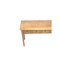 Contemporary oak, mahogany, and figured burr walnut narrow console table, moulded rectangular top with oak band and satinwood stringing, five cock beeded short drawers with turned handles, moulded and canted square supports 