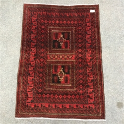 Baluchi red ground rug, repeating border, 154cm x 112cm