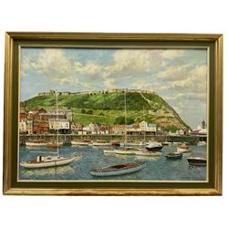 Walter Lambert Bell (Sheffield 1904-1983): Scarborough Foreshore from the Pier, oil on canvas signed 49cm x 70cm
