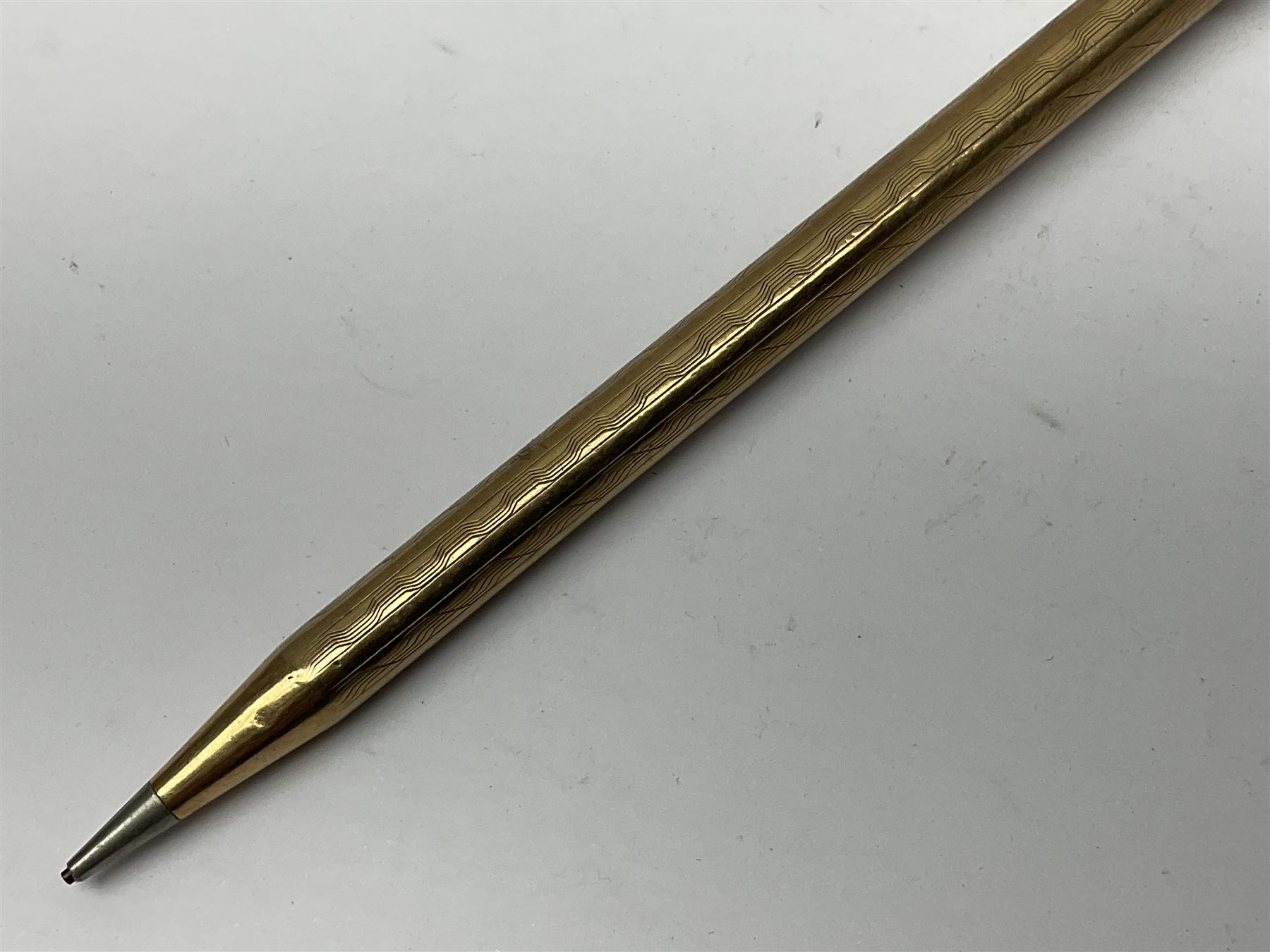 9ct gold 'Lifelong' propelling pencil, with engine turned decoration, stamped 9ct 