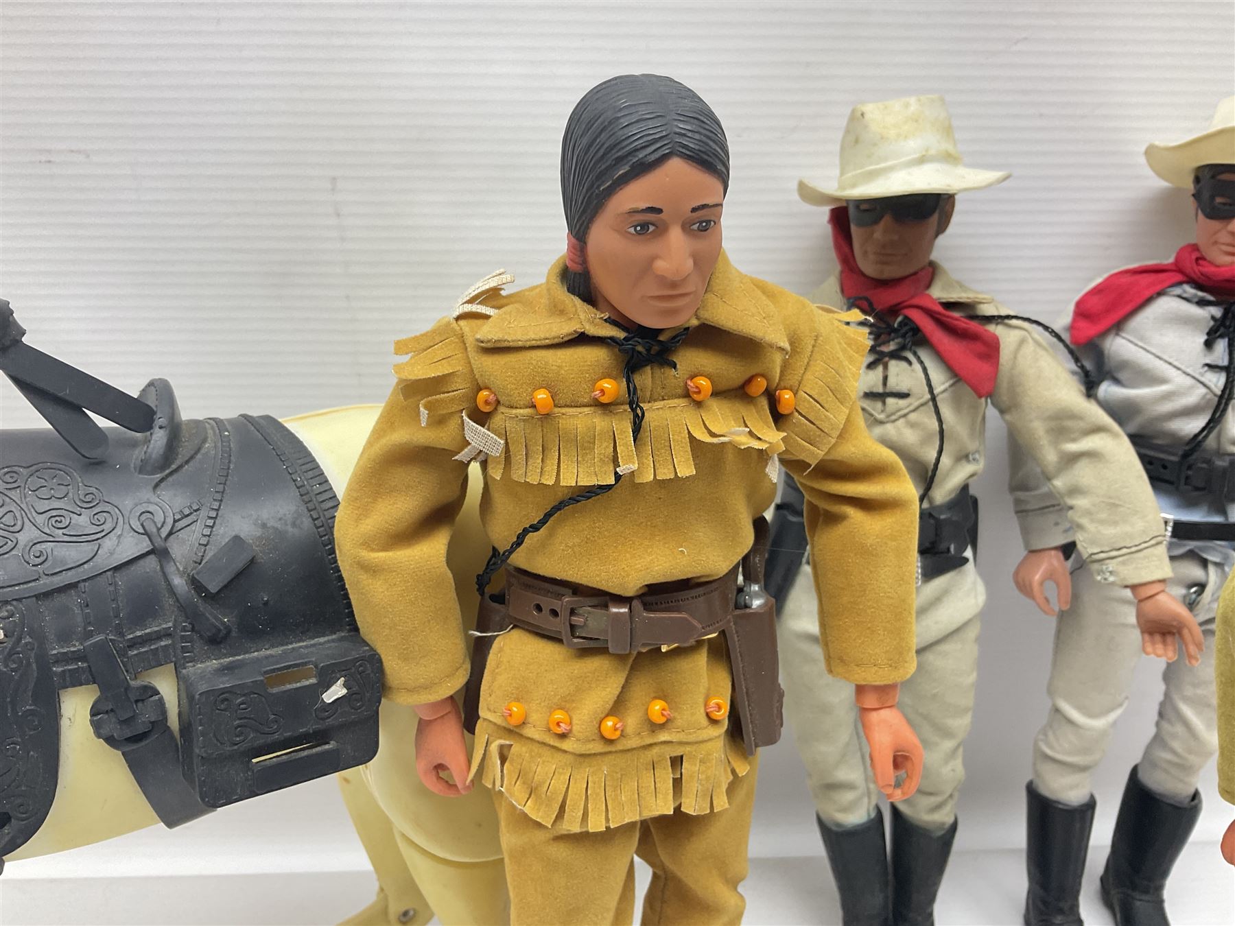 Two pairs of 1970s Lone Ranger and Tonto action figures, probably by Marx Toys; and Gabriel 'Silver' stallion horse; all unboxed (5)