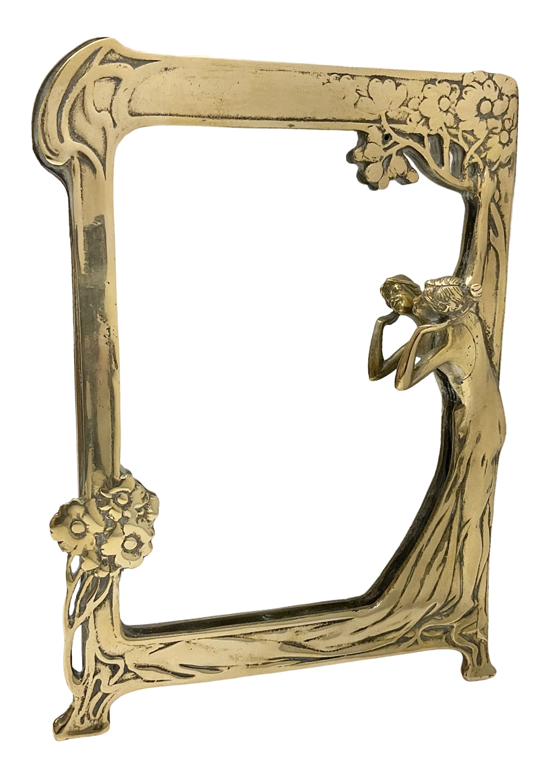 Art Nouveau style mirror in the manner of WMF, decorated with a female figure and floral motifs, the easel support verso with spurious WMF, H35cm