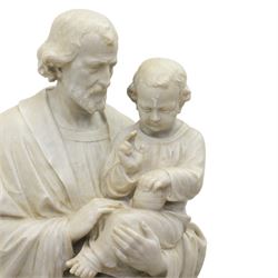 Carved stone and alabaster figure group of Saint Joseph and the Christ Child, modelled standing holding the infant, draped in flowing robes, raised on square plinth base
