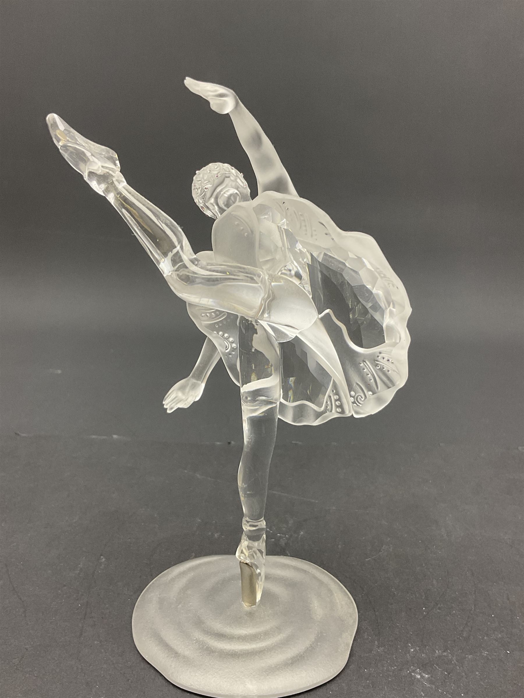 Three Swarovski figures, comprising flamenco dancer, female dancer with certificate and ballerina, tallest H21cm  