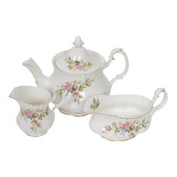 Royal Albert Moss Rose tea and dinner wares, including teapot, coffee pot, fourteen cups and saucers, milk jug, open sucrier etc  