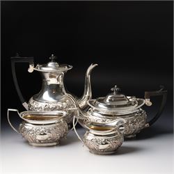 Late Victorian four piece silver tea set comprising teapot, coffee pot, sugar bowl and mil...