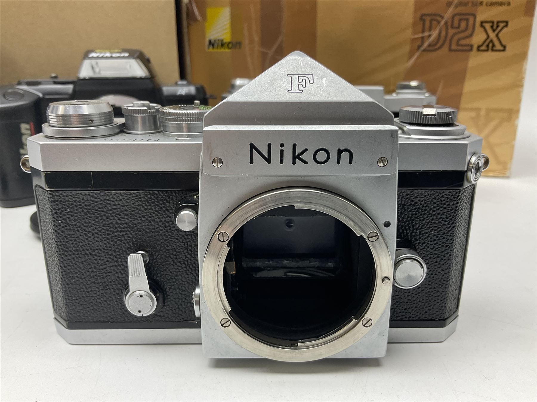 Nikon F-401 camera body, serial no. 2064766, together with Nikon Shutter Speed range, serial no.106395, and other Nikon equipment and camera bodies 