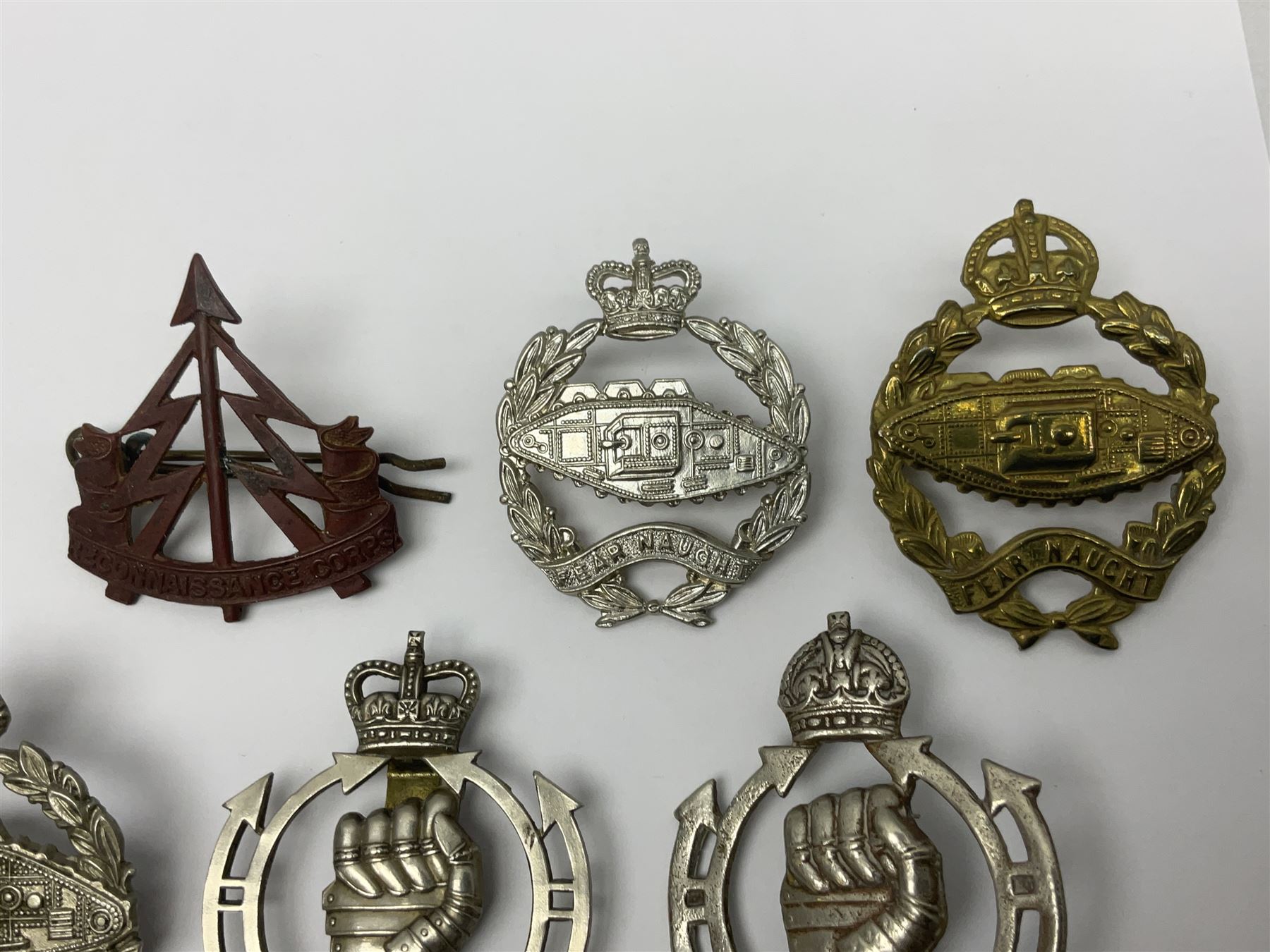 Twenty-seven military metal cap badges including Royal tank Corps, Reconnaissance Corps, Royal Armoured Corps, Royal Corps of Signals, Womens Army Auxiliary Corps, Queen Mary's Army Auxiliary Corps, Auxiliary Territorial Service,  Royal Engineers, REME, Army physical Training Corps etc 
