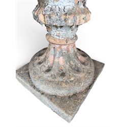 19th century terracotta campana shape urn planter, egg-and-dart moulded rim over a cherub-mask and gadrooned underbelly, turned pedestal and socle on square base