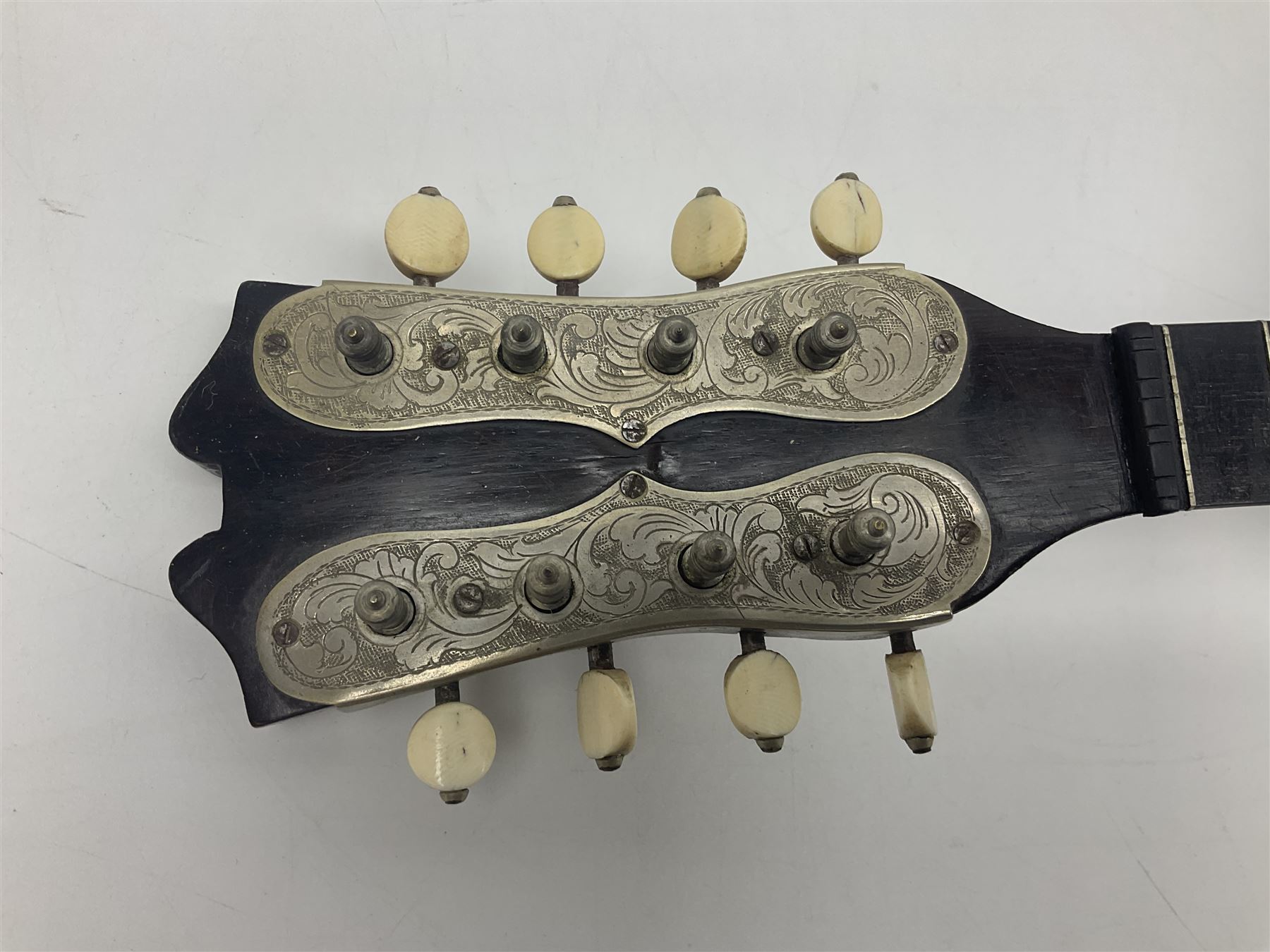French mandolin with segmented lute back and mother-of-pearl inlaid spruce top; bears label for 'Jerome Thibouville-Lamy & Cie Paris L60cm; and another unmarked flat-back mandolin; both for completion (2)