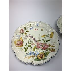 A pair of Italian faience pottery plates, by Giovanni Battista Viero, each of circular form with piecrust rim, with painted floral decoration, each with painted mark beneath, (a/f), D37.5cm
