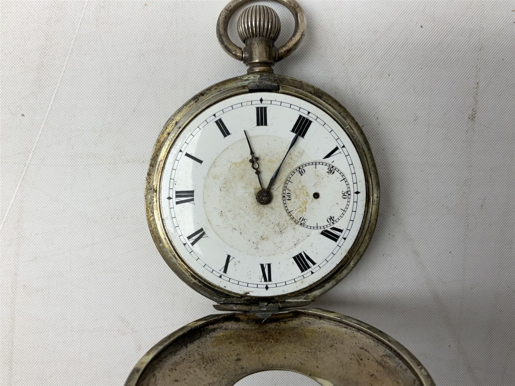 Miniature all nickel 2mm pin fire single shot pistol with engraved grip L4.5cm; together with a .925 silver half hunting cased keyless wind pocket watch inscribed 'Presented to Pte. P. Sizer By No.2 Company 1st Battalion Lincolnshire Regmt For Gallant Conduct Nr. Cork (Ireland) 31.7.20' (2)