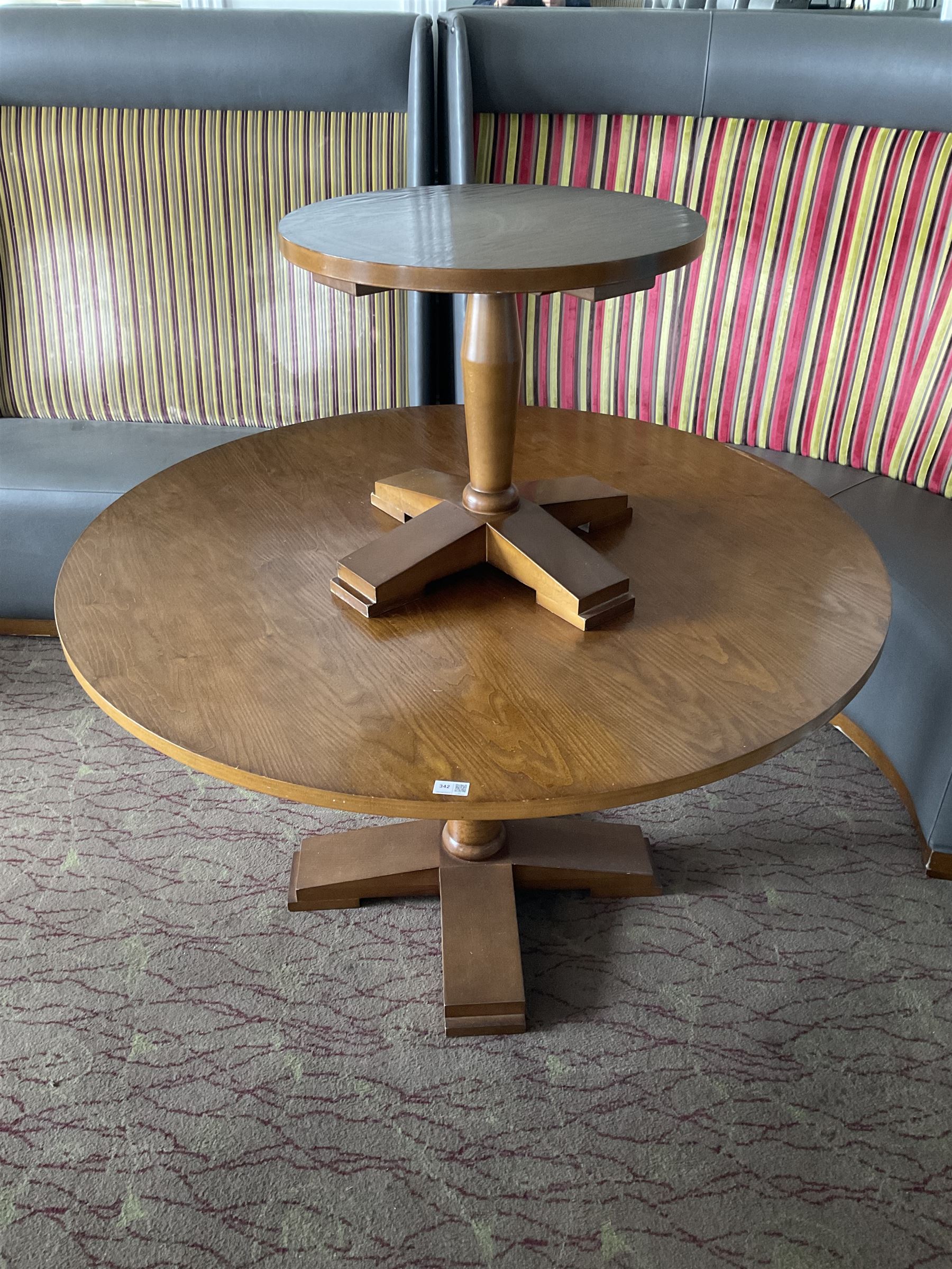 Set of three round (D125cm x H75cm), and one small round (D55cm x H49cm), walnut finish dining tables (4)- LOT SUBJECT TO VAT ON THE HAMMER PRICE - To be collected by appointment from The Ambassador Hotel, 36-38 Esplanade, Scarborough YO11 2AY. ALL GOODS MUST BE REMOVED BY WEDNESDAY 15TH JUNE.
