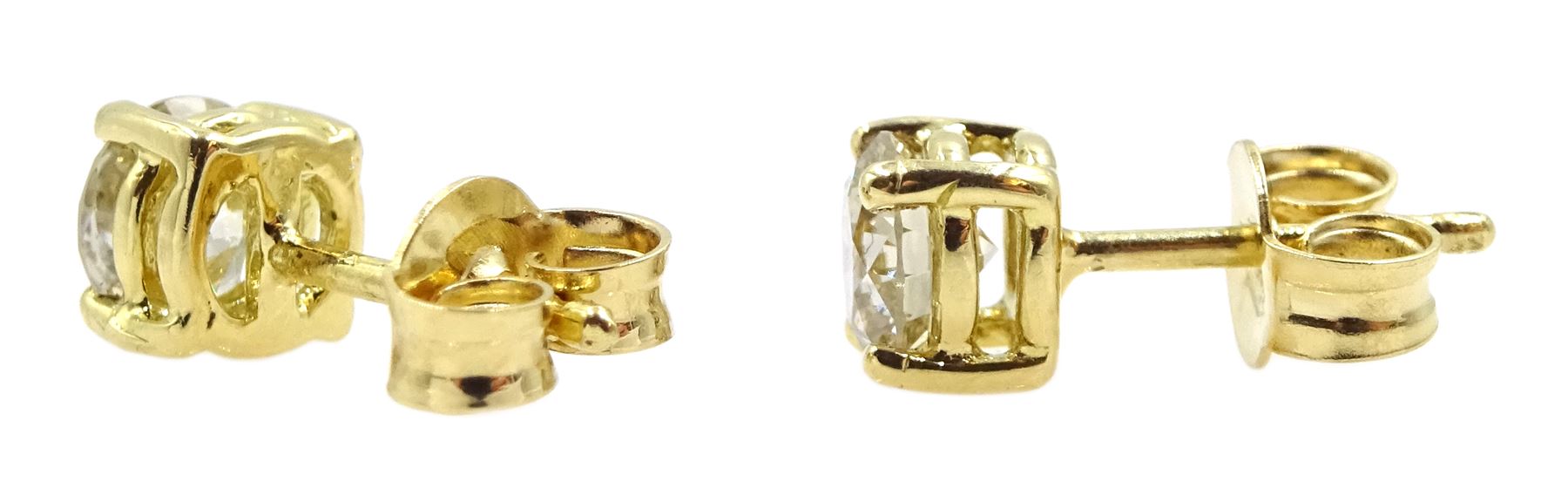 Pair of 18ct gold diamond stud earrings, stamped 750, total diamond weight 0.85 carat, with WGI certificate