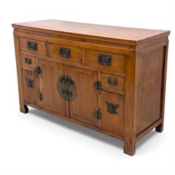 Late 20th-century Thai elm sideboard fitted with an arrangement of three drawers over a central cupboard flanked by a further two drawers, raised on square post feet 