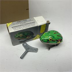 Twenty six tinplate models to include Ferris Wheel and Performing Circus Elephant, marked JW, further similar examples such as Duck on a Bike, Clown on Roller, Carousel; Popeye Tin Speedboat; Looney Tunes Wind Up Cars and Express Train; various international examples, MS107 Jumping Bambi, Pop Pop Boat, jumping frogs, pecking chickens etc; both boxed and loose