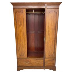 Edwardian figured mahogany and satinwood banded wardrobe, enclosed by shield shaped bevelled mirror door, flanked by panelled uprights, drawer to base, on bracket feet 