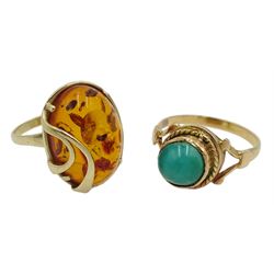 Polish 14ct gold oval Balic amber ring, hallmarked and an 18ct single stone turquoise ring