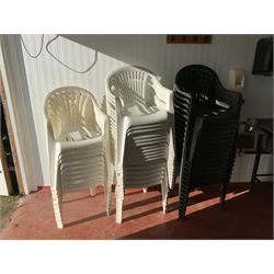 27 White plastic stacking chairs and 15 charcoal stacking chairs, 4 charcoal and 3 white circular tables - THIS LOT IS TO BE COLLECTED BY APPOINTMENT FROM DUGGLEBY STORAGE, GREAT HILL, EASTFIELD, SCARBOROUGH, YO11 3TX
