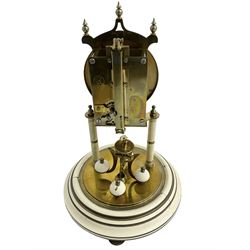 Mid-20th century Kundo torsion clock - Keininger & Obergfell German 400-day clock with a glass dome , enamel dial and pierced steel hands, arabic numerals and floral swags, movement supported by two pillars on a painted circular base, torsion suspension intact, with key.